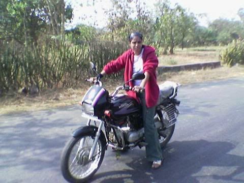 women driving her bike