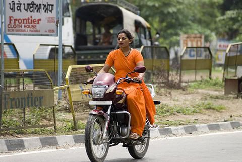 Photobucket - Women on fire Driving her passion bike in Hyderabad 