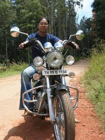 prishi driving on her bike