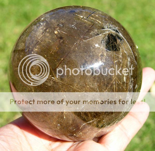 rutilated quartz sphere is excellent quality from brazil very 