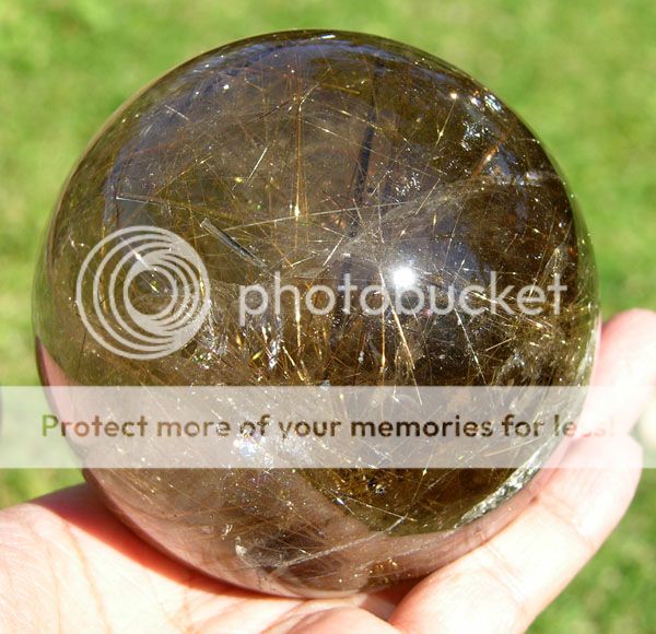 rutilated quartz sphere is excellent quality from brazil very 